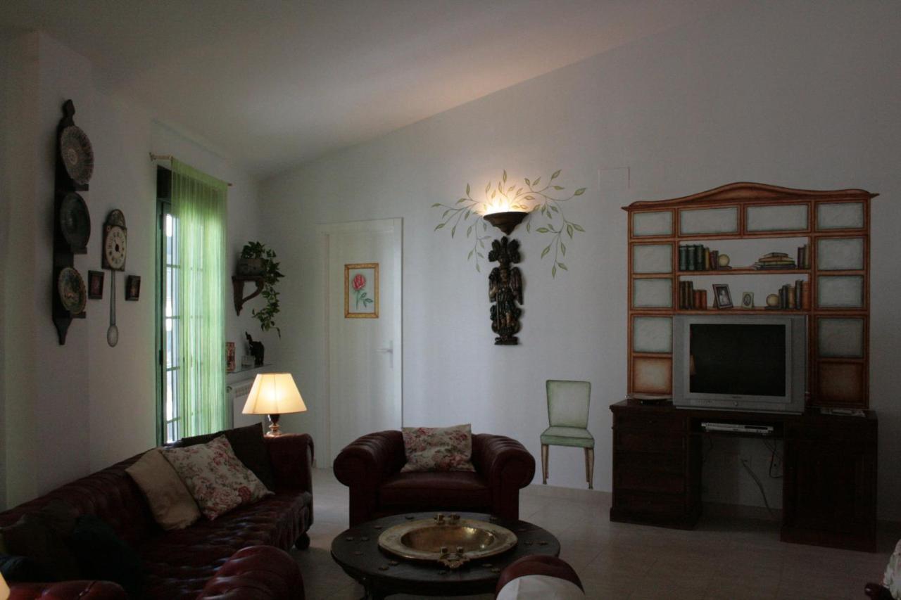 Apartamentos La Casa Pintada Caces Extérieur photo